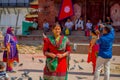 KATHMANDU, NEPAL OCTOBER 15, 2017: Unidentified nepalese woman wearing typical clothes posing for camera, in a Durbar