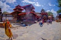 KATHMANDU, NEPAL OCTOBER 15, 2017: Unidentified people and sadhu budhist walking in a Durbar square in a beautidul sunny