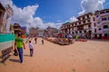 KATHMANDU, NEPAL OCTOBER 15, 2017: Unidentified people walking in a the square with lots of colorful souvenirs in street