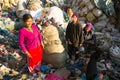 KATHMANDU, NEPAL - people from poorer areas working in sorting of plastic on the dump Royalty Free Stock Photo