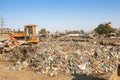 KATHMANDU, NEPAL - people from poorer areas working in sorting of plastic on the dump Royalty Free Stock Photo