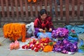 Kathmandu, Nepal, September, 30, 2013, Nepali Scene: Woman sells ritual flowers on the street in Kathmandu