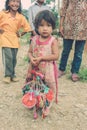 Kathmandu, Nepal - September 22, 2016: Unidentified Nepalese little girl carrying colorful bags in her hand, Nepal.