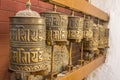 Tibetan Buddhist spinning prayer drums with mantras