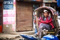 KATHMANDU, NEPAL - Unidentified nepali rickshaw in historic center of city.