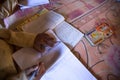 KATHMANDU, NEPAL - Unknown children doing homework at Jagadguru School.