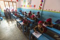 KATHMANDU, NEPAL - Unknown pupils in English class at primary school. Only 50% of children in Nepal can reach 5 Royalty Free Stock Photo