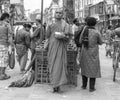 Monk with pot on the street, nepal