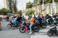 Kathmandu Urban Buzz: moto scooters on the dusty Nepalese streets in Kathmandu, Nepal. Pollution, disorderly urban growth and