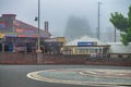 KATOOMBA, AUSTRALIA - NOVEMBER 2015: Katoomba station and roundabout on a foggy day Royalty Free Stock Photo