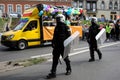 Polish policemen in action, white helmets, plastic covers