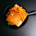 Katsu Curry `Fried` Chicken Burger in frying pan