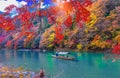 Katsura River with Boatman punting the boat for tourist in kyoto Japan