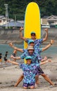 Surf school, a group of people are learning to surf in Chiba close to Ichinomiya.