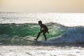 Two teenage boys are surfing before school in Japan Royalty Free Stock Photo