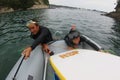 Japanese teenage boys on a dive adventure in Japan on an inflatable boat