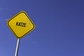 Katze - yellow sign with blue sky background