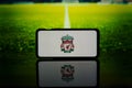 Logo of English Premier League club Liverpool on screen Royalty Free Stock Photo