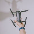 Holding DJI Mavic Air drone