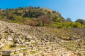 KAUNOS, DALYAN, TURKEY: View of the ruins of the Amphitheater and the fortress in the ancient city of Kaunos.