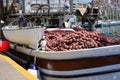 KAVALA, GREECE- MAY 31, 2016: Fishing nets and buoys on board a fishing boat in the port of Kavala, Greece