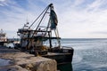 Kavarna, Bulgaria - September 2016: Fishing trawler lies at the harbor in calm seas in the morning