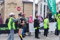 Kavkaz run volunteers award the finishing participants with commemorative medals