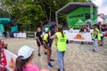 Kavkaz swim run volunteers award the finishing participants with commemorative medals