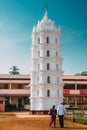 Kavlem, Phonda, Goa, India. People Walking Near Shree Shantadurga Mandir, Kavlem Temple. Famous Landmark And Popular