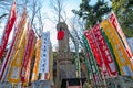 KAWAGOE,SAITAMA PREFECTURE, JAPAN - FEBRUARY 3 ,2016 : Ancient buddha statue and colorful flag at Kitain temple