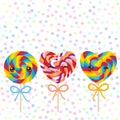 Kawaii Valentine`s Day Heart shaped candy lollipops with bow, colorful spiral candy cane with bright rainbow stripes. on stick wit Royalty Free Stock Photo