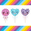 Kawaii Valentine`s Day Heart shaped candy lollipops with bow, colorful spiral candy cane with bright rainbow stripes. on stick wit Royalty Free Stock Photo