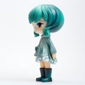 Kawaii Vinyl Toy With Green Hair - Monochromatic Depth And Shiny Eyes