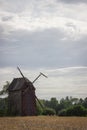 Kawnice, Poland. Old ruined windmill on the field. Royalty Free Stock Photo