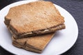 Kaya Toast (Asia Snack) on the white dish and table.