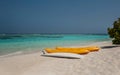 Kayak on the beach .kayaks at beautiful tropical beach with palm trees, white sand, turquoise ocean water and blue sky