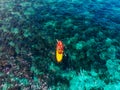 Kayak boat turquoise blue water sea, sunny day. Concept travel. Aerial top view