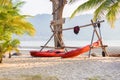 Kayak boats on a tropical beach.