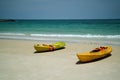 Kayak boats on white sand beach Royalty Free Stock Photo