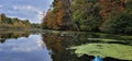 Kayak on mirror Lake fall colors reflecting in the water Royalty Free Stock Photo