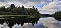 Kayak on mirror Lake state park fall colors and evergreens reflecting in the water Royalty Free Stock Photo