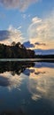 Kayak on mirror Lake sunset on a cloudy evening fall colors reflecting Royalty Free Stock Photo