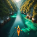 Kayak navigating through a narrow channel between two emerald g Royalty Free Stock Photo