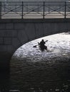 Kayak paddler on Copenhagen canal Royalty Free Stock Photo