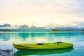 Kayak parked between the picturesque views of the mountain dam a