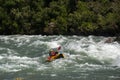 Kayak in the rapids of the river.