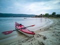 Kayak on a sandy beach in Greece, Aegean Sea