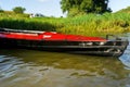 Kayak Taimen red boat on the shore Royalty Free Stock Photo