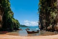 Kayak and Thai wooden longtail boat on the beach, Krabi - Thailand