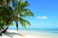 Kayak on a tropical white beach Royalty Free Stock Photo